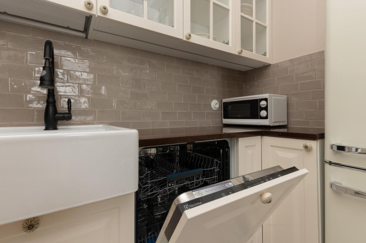 Metro Rondo Onz Apartment By Noclegi Renters Варшава Экстерьер фото